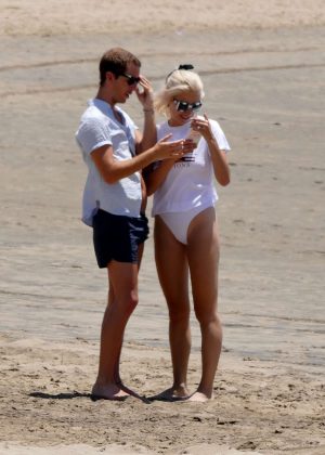 Pixie Lott in White Swimsuit on the beach in Los Angeles
