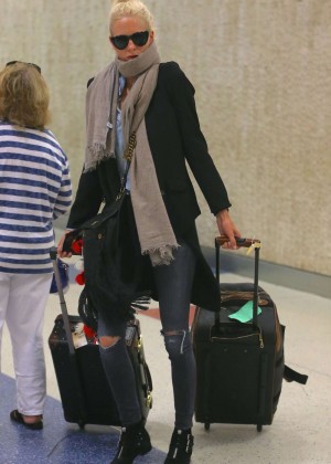 Poppy Delevingne in Ripped Jeans at JFK Airport in NY