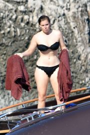 Princess Beatrice in Black Bikini on the boat in Capri