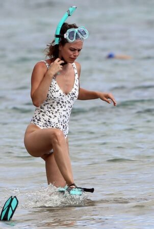 Rachel Bilson - In a one piece swimsuit on the beach in Hawaii