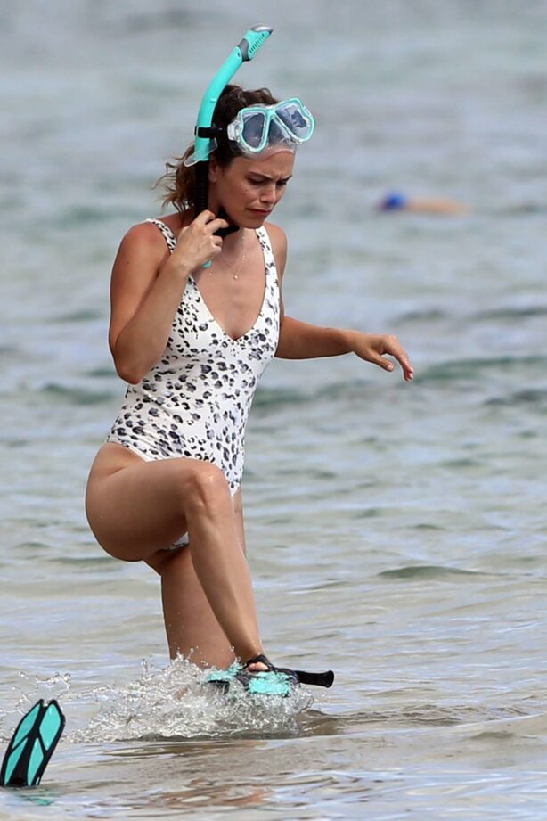 Rachel Bilson - In a one piece swimsuit on the beach in Hawaii