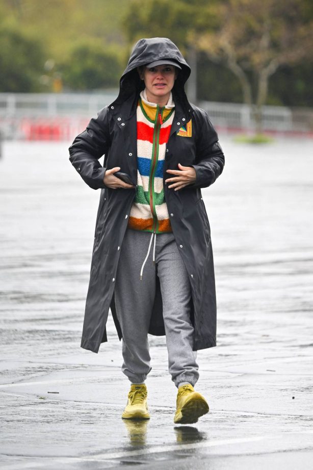 Rachel Bilson - Wearing an oversized rain coat in Pasadena