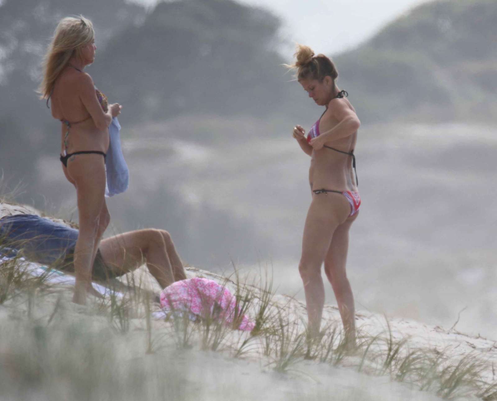 Rachel Hunter in Bikini on the beach in New Zealand. 