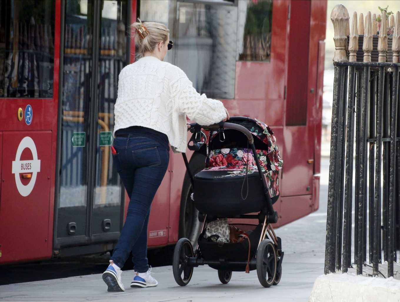 Rachel Riley â€“ Seen with baby daughter Maven Aria in Central London