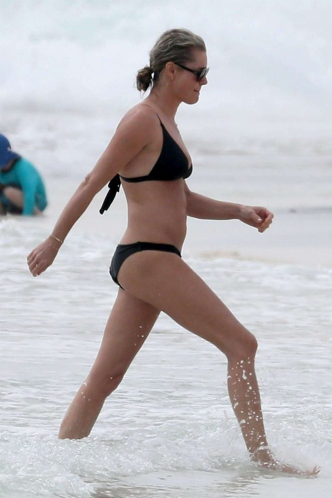 Rebecca Romijn in Black Bikini on the beach in Tulum