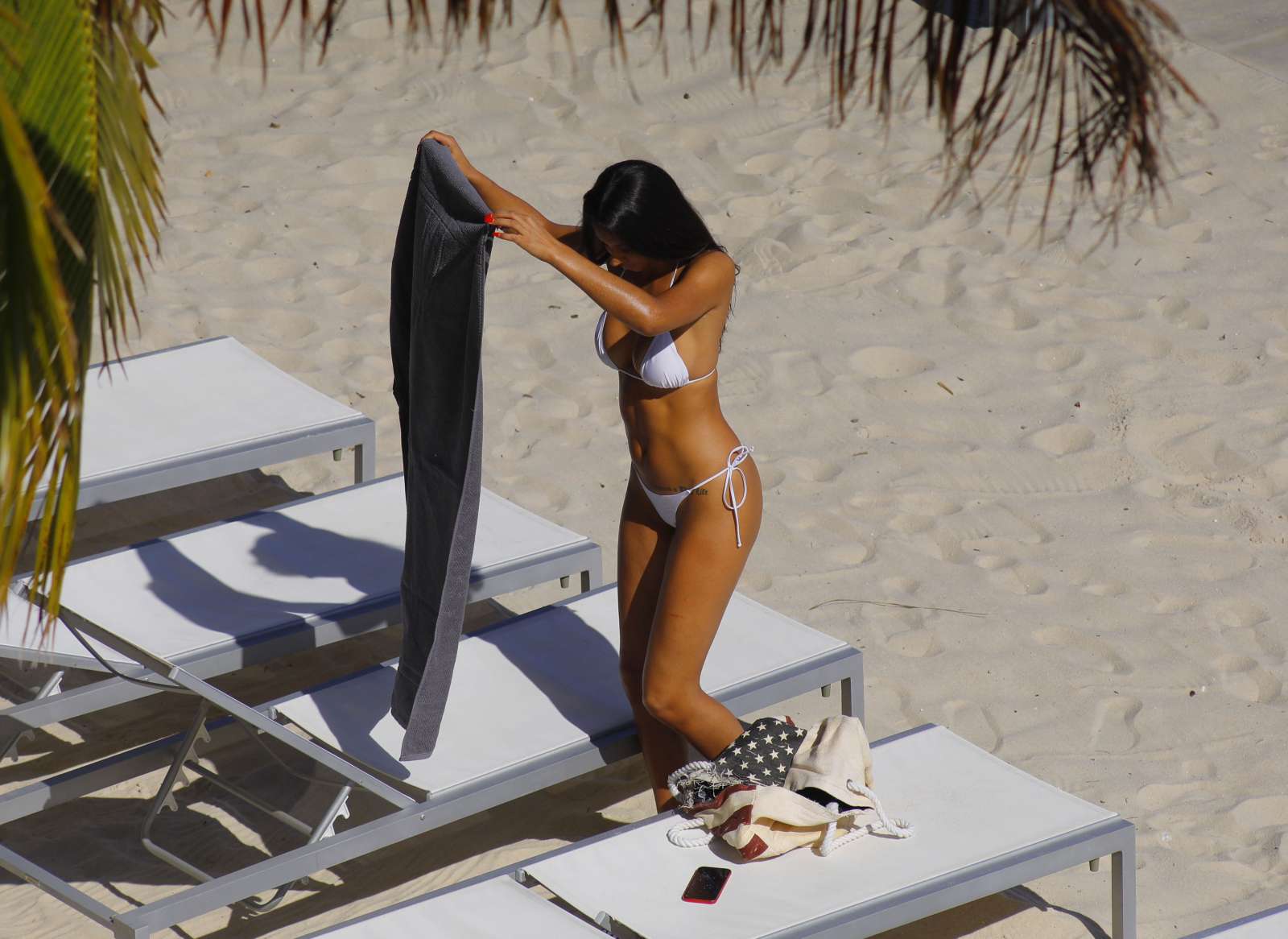 Rebecca Scott in White Bikini on the beach in Miami. 