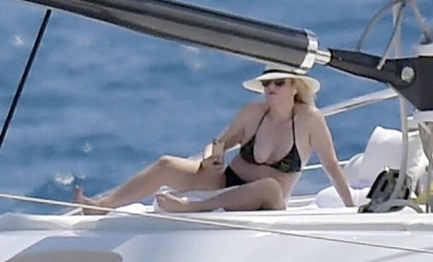 Rebel Wilson - In a yacht in a bikini
