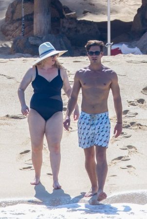 Rebel Wilson in black swimsuit with boyfriend Jacob Busch in Cabo San Lucas