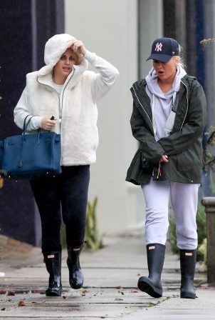Rebel Wilson - With Ramona Agruma Stepped out despite the rainfall in Los Angeles