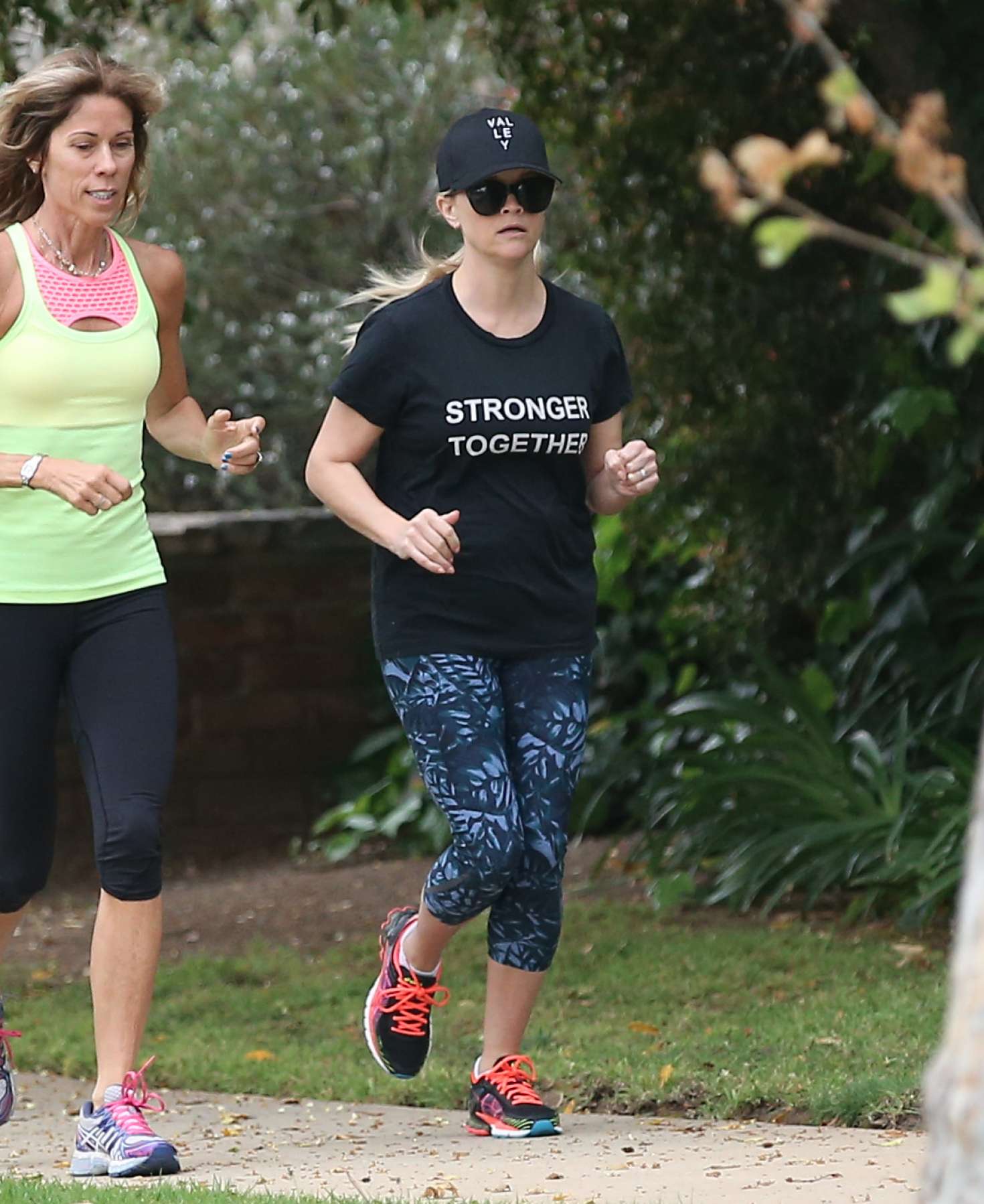 Reese Witherspoon at a jog in the rain in Brentwood | GotCeleb