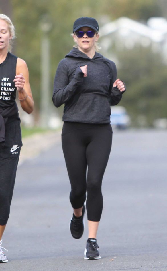 Reese Witherspoon - Jogging candids with a friend in Los Angeles