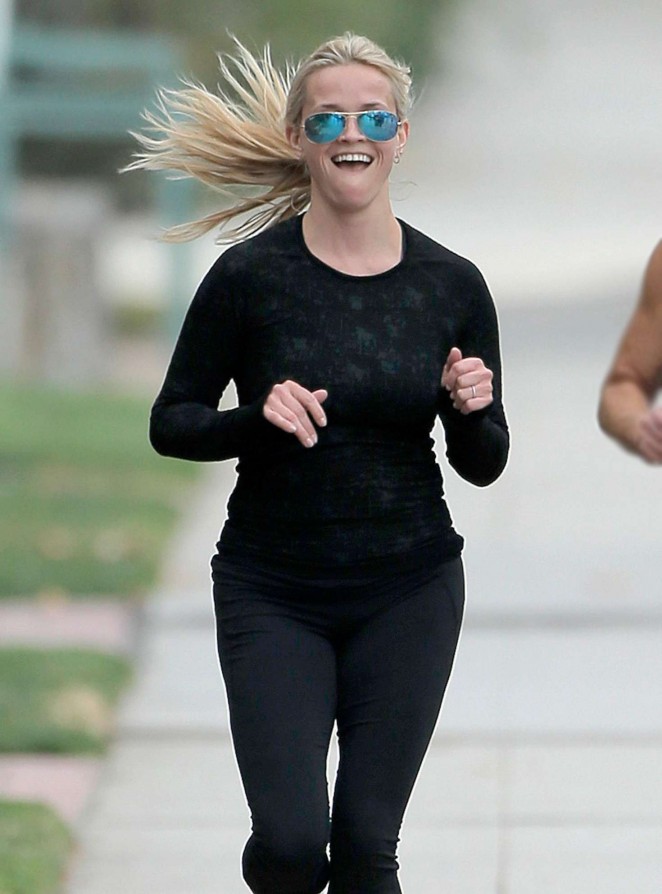 Reese Witherspoon jogging with a friend in Brentwood