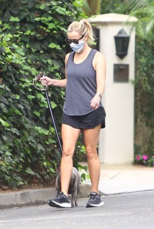 Reese Witherspoon - Seen at morning power walk with her dog in Brentwood