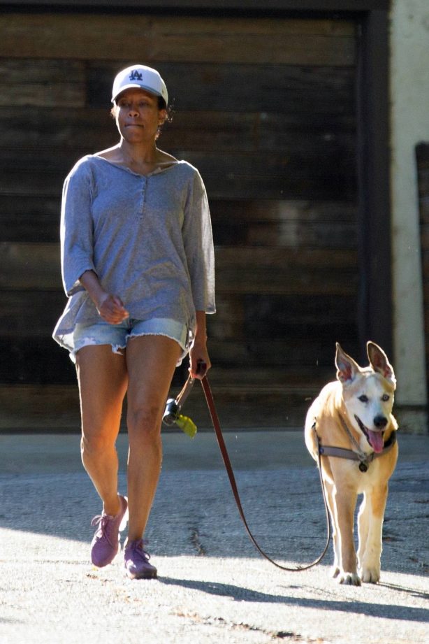 Regina King - Takes her dog out for a walk in Los Angeles