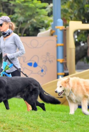 Renee Zellweger - With her two dogs at the park in Laguna Beach