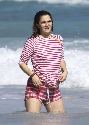 rew Barrymore at a beach in Tulum