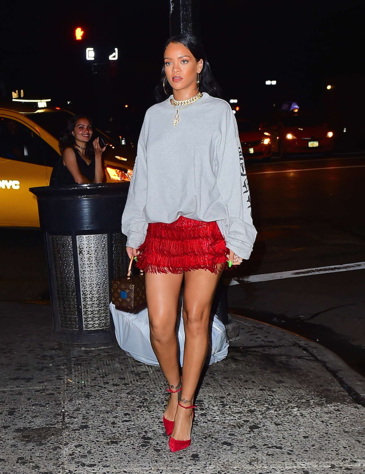 Rihanna in a red fringed skirt at Avenue Nightclub -08 | GotCeleb