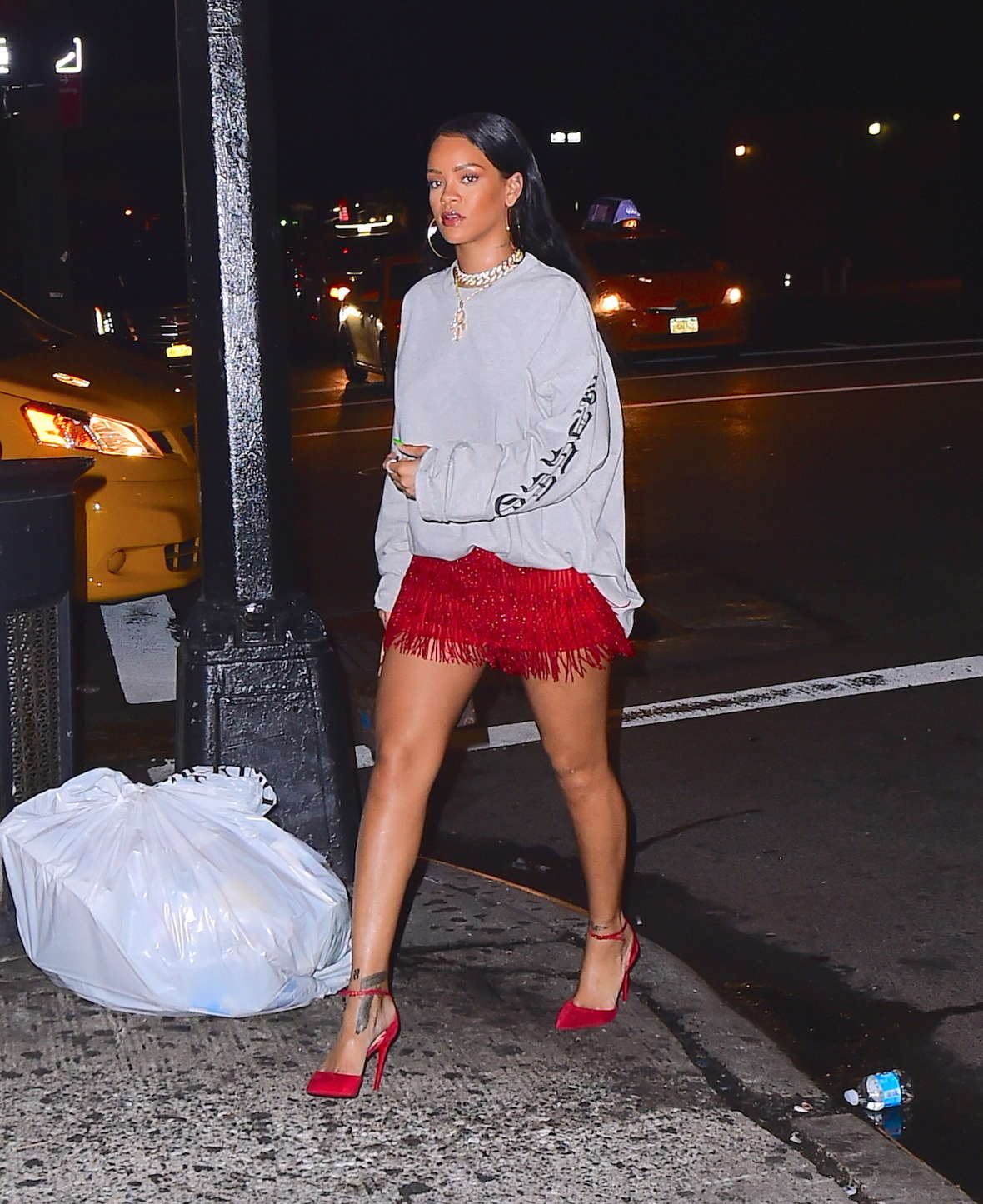 Rihanna in a red fringed skirt at Avenue Nightclub -18 | GotCeleb