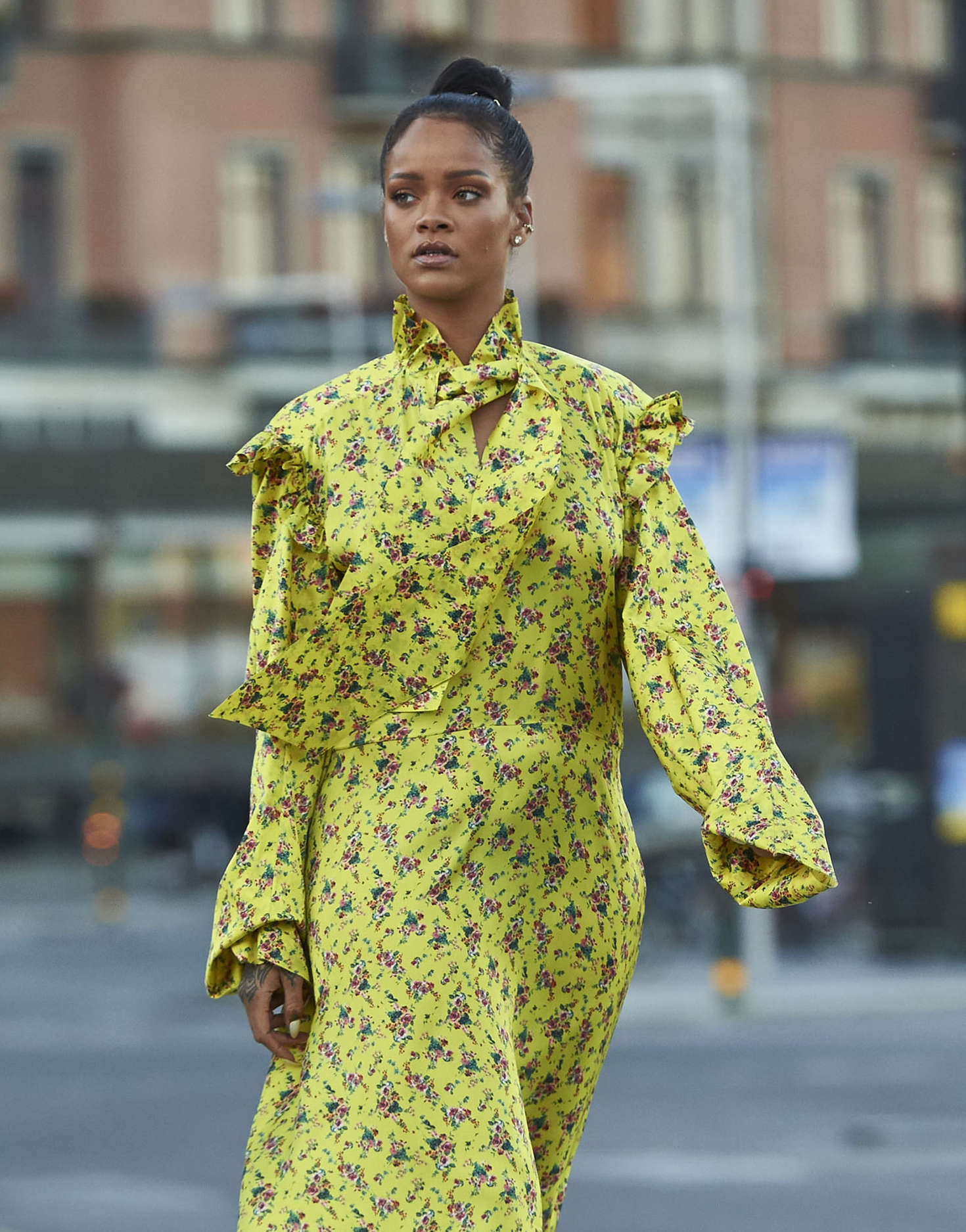 Rihanna in Yellow Dress out in Stockholm | GotCeleb