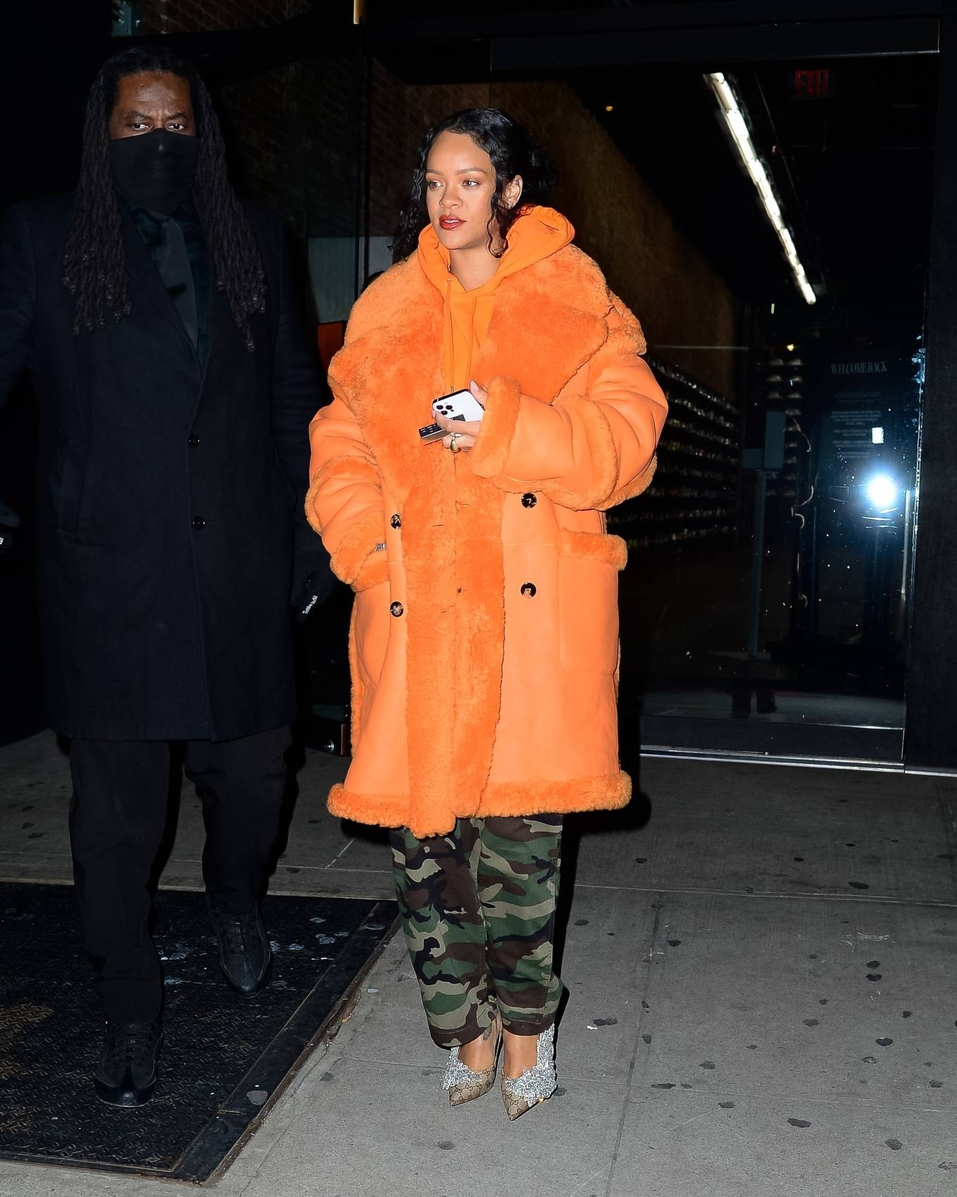 Rihanna 2022 : Rihanna – Out in a furry orange coat for a shopping at Flight Club shoe store in New York-03