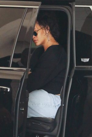 Rihanna - Running some errands with her security guard in Beverly Hills