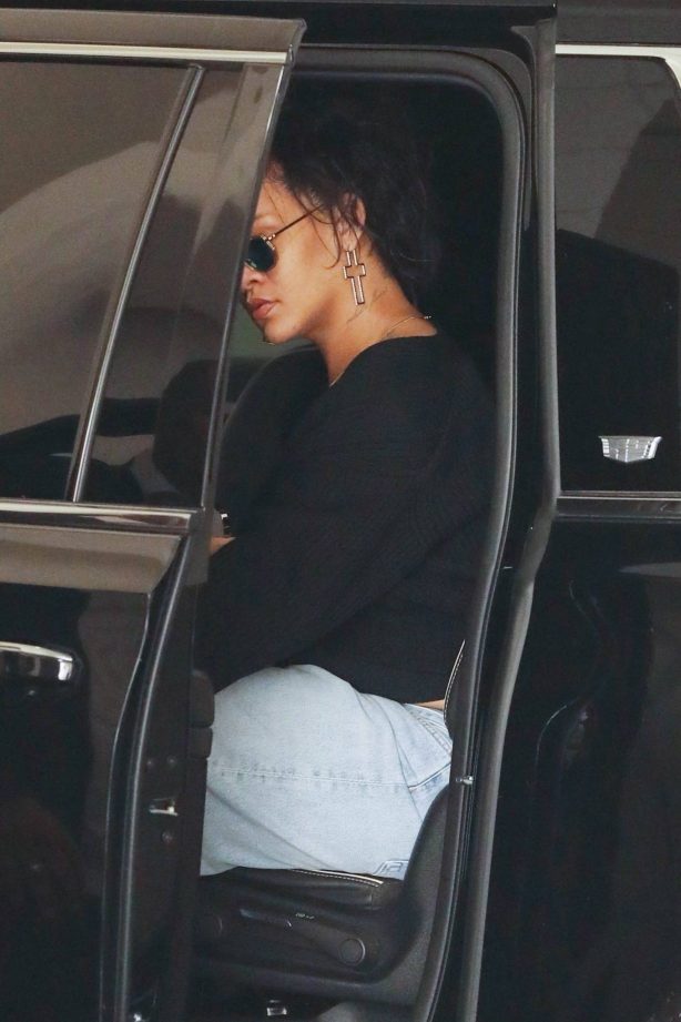 Rihanna - Running some errands with her security guard in Beverly Hills
