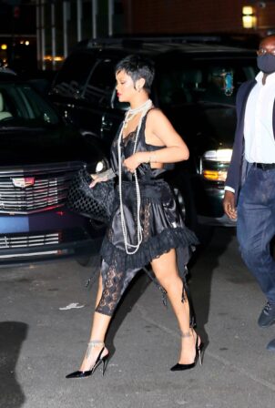 Rihanna - Seen at Carbone Italian restaurant in a black lace dress in New York
