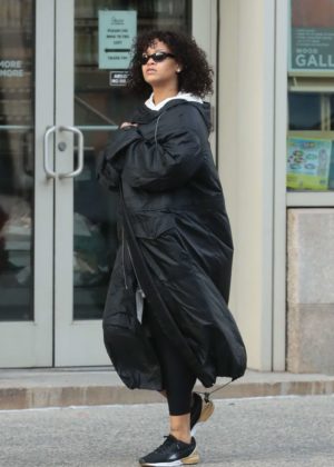 Rihanna wears a black maxi coat in New York