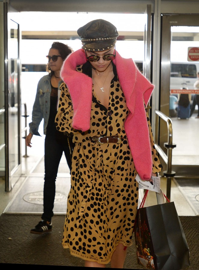 Rita Ora in Leopard Robe at Airport in Miami
