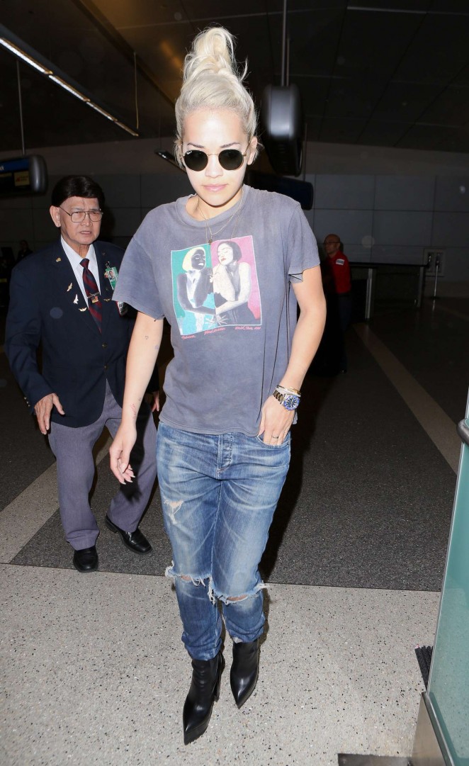 Rita Ora in Ripped Jeans at LAX Airport in LA