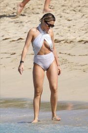 Rita Ora in White Swimsuit on the beach in St Barths