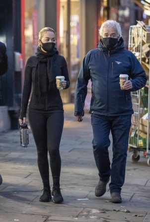 Rita Ora - Leaving a coffee shop with her father in Kensington
