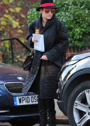 Rita Ora in Long Black Coat Leaving her home in London