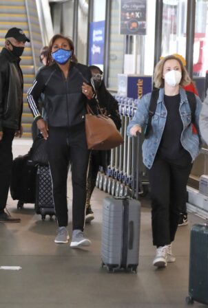 Robin Roberts and Amber Laign - Seen arriving in Los Angeles