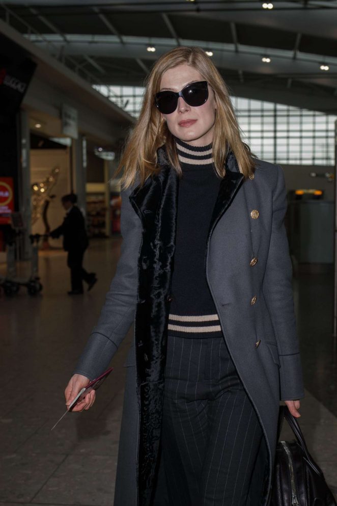 Rosamund Pike at Heathrow Airport in London