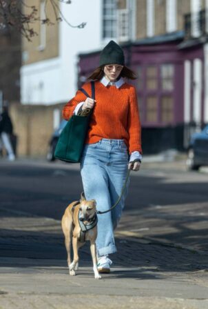 In dog Rose walking Leslie – Spotted North while her How ‘Game