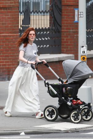 Rose Leslie - Takes her newborn for a stroll in the city in New York
