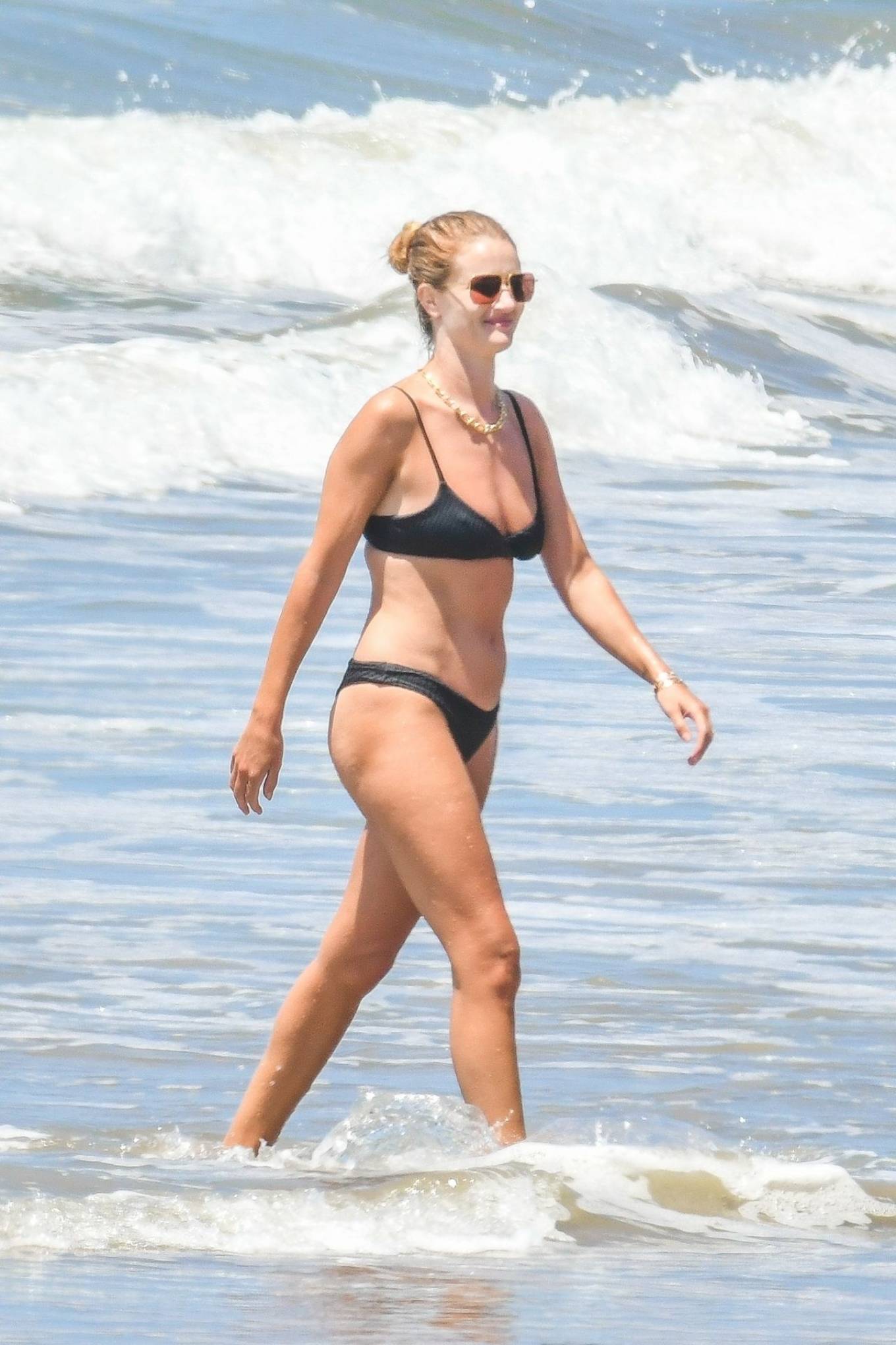 Rosie Huntington Whiteley in Black Bikini at the beach in Malibu
