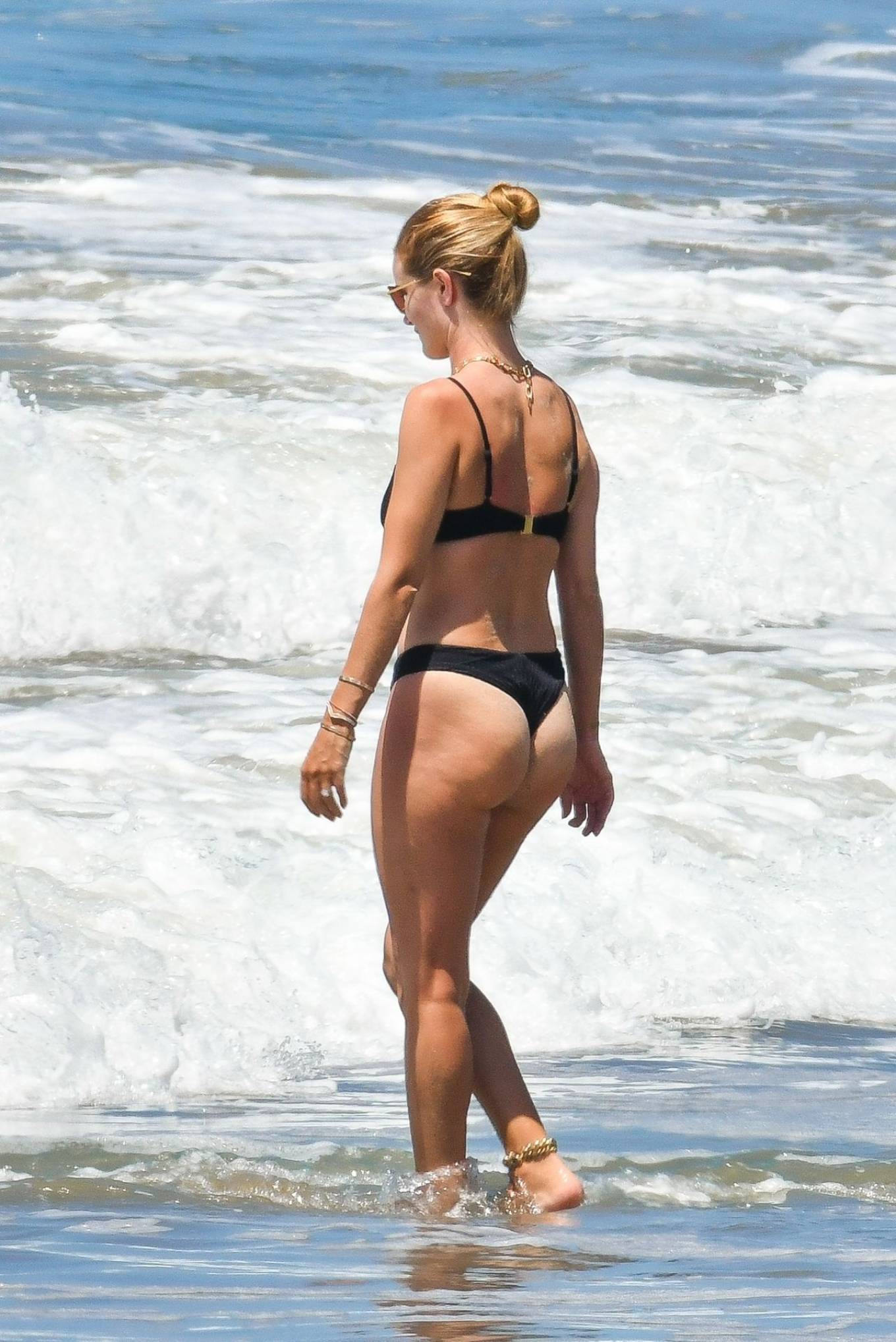 Rosie Huntington Whiteley in Black Bikini at the beach in Malibu