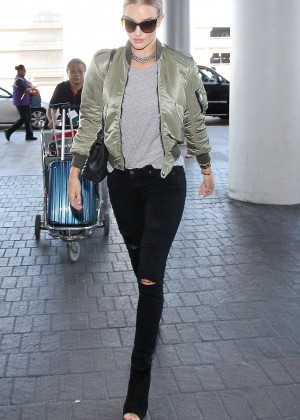 Rosie Huntington Whiteley in Ripped Jeans at LAX in LA