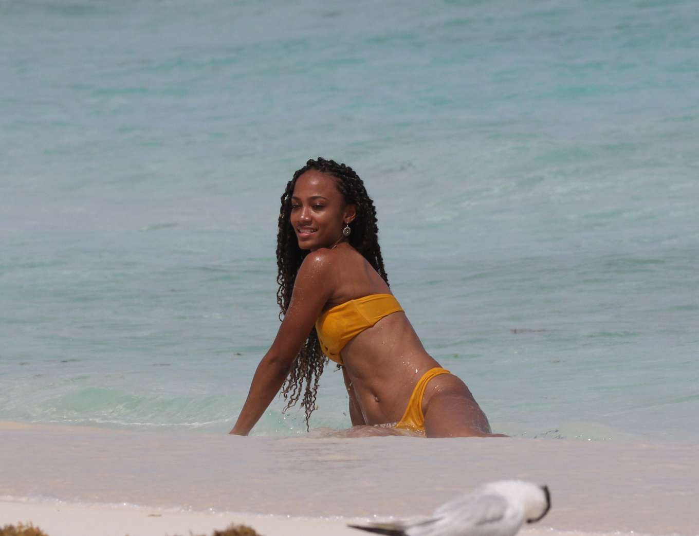 Roxanne Didier in Yellow Bikini on the beach in Tulum. 