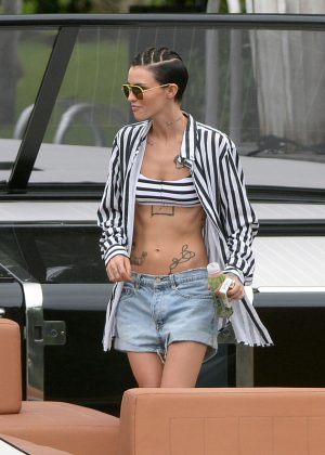 Ruby Rose in Jeans Shorts on a boat in Miami Beach