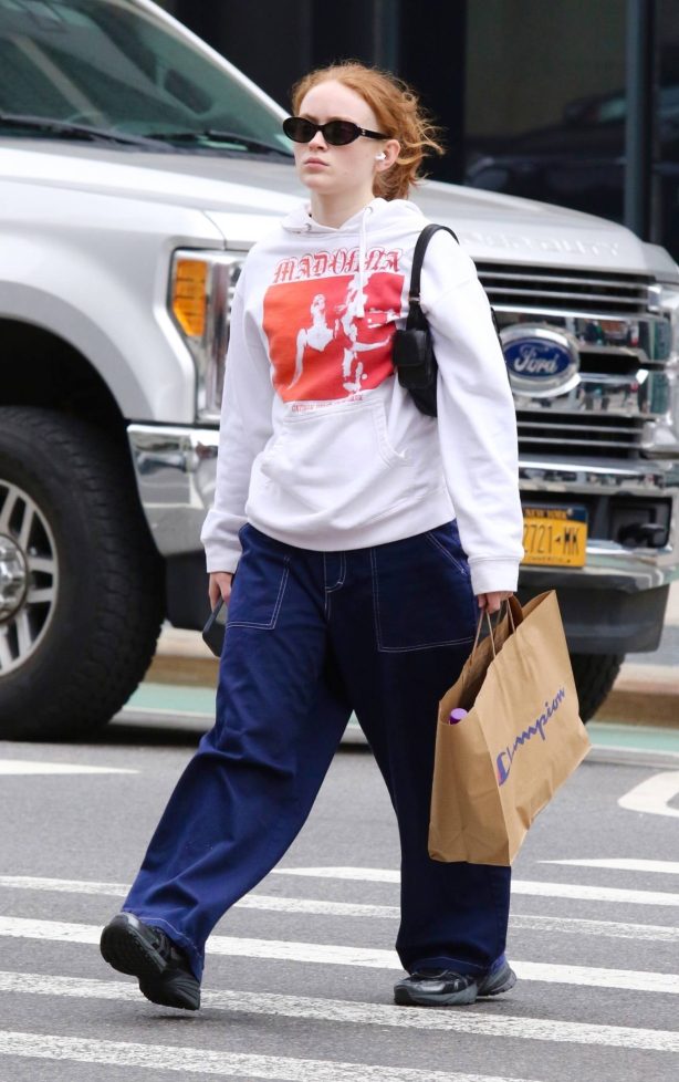 Sadie Sink - Wearing vintage Madonna hoodie while shopping in Manhattan’s Downtown area