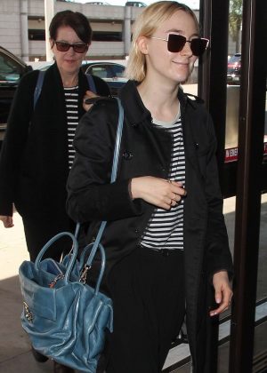 Saoirse Ronan at LAX Airport with her mother in Los Angeles