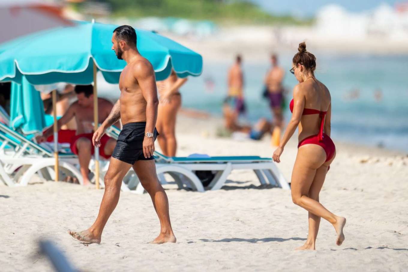 Sara Corrales in Red Bikini on the beach beach day in Miami. 