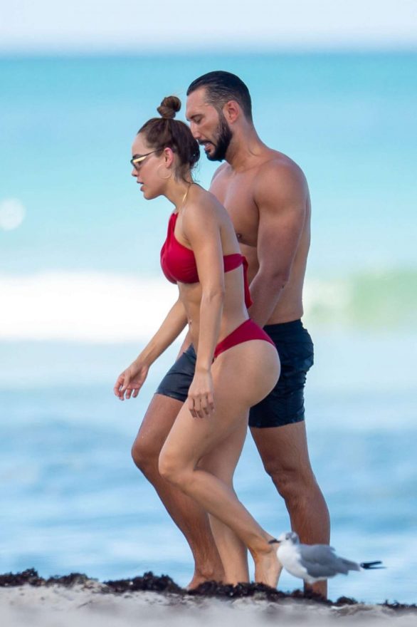 Sara Corrales in Red Bikini on the beach beach day in Miami