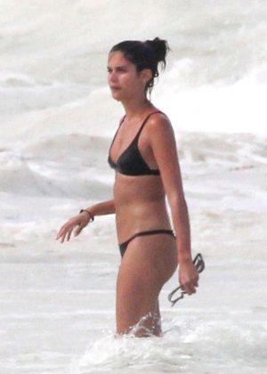 Sara Sampaio in Black Bikini on the beach in Tulum
