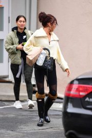 Sarah Hyland in Black Tights and Hunter Wellies Boots - Out and about in Los Angeles