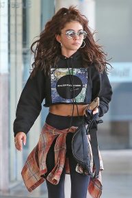 Sarah Hyland - Shows her tanned abs in Los Angeles