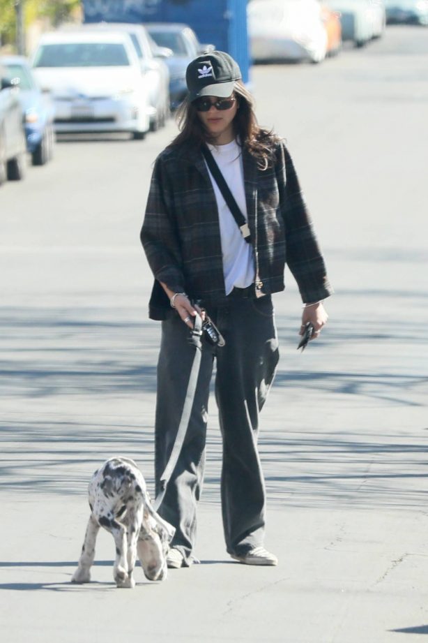 Sasha Calle - Is seen with her puppy in Los Angeles